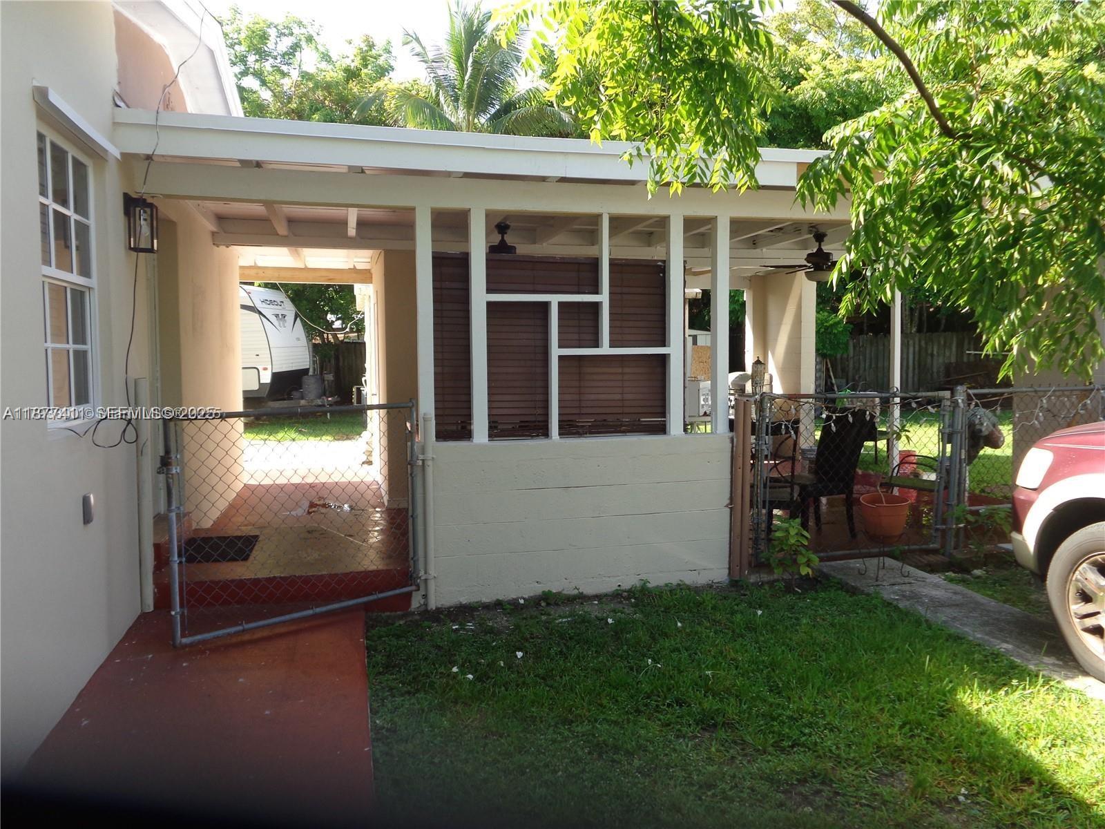 10020 Dominican Drive Cutler Bay, FL 33189 - Photo 6 of 22 a view of house with backyard space and porch