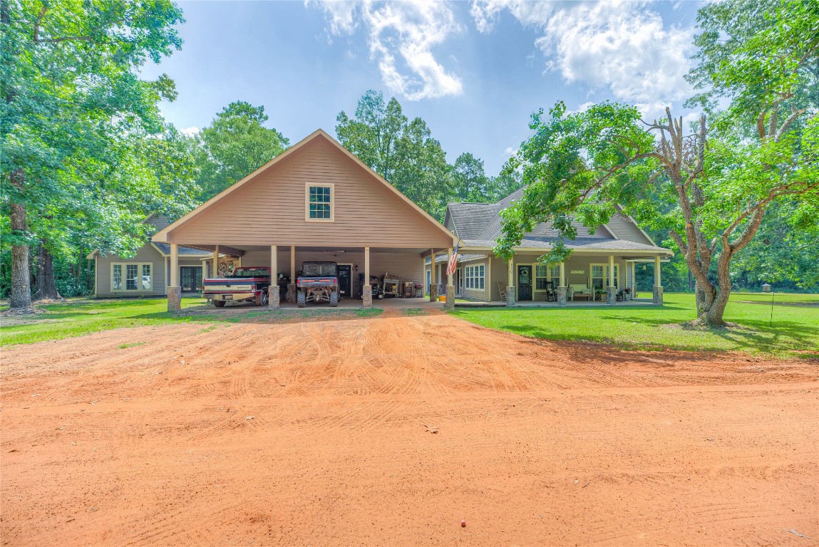 View of both homes and 3 car carport