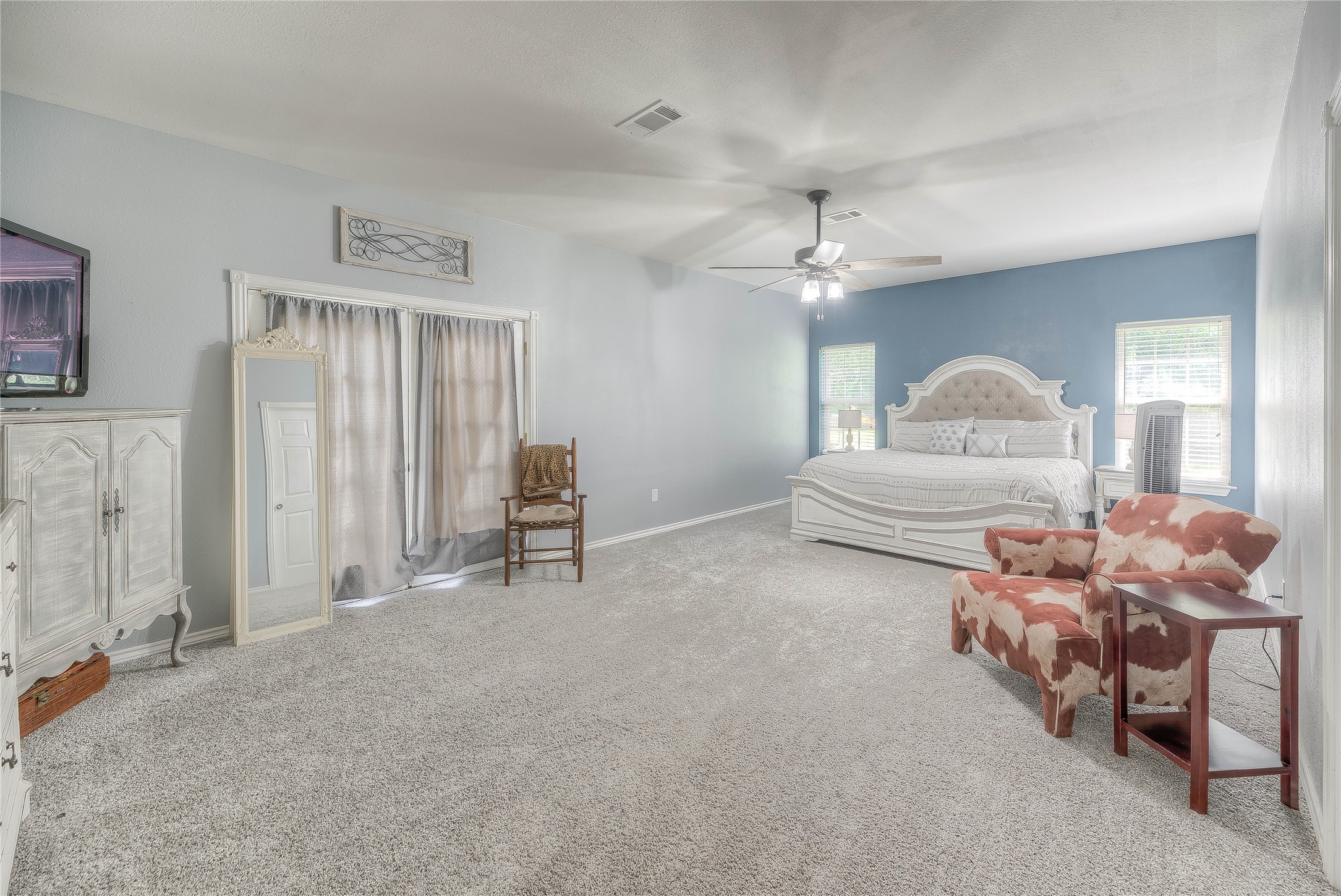 110 Happy Trails Road Coldspring, TX 77331 - Photo 11 of 49 a living room with furniture and a chandelier