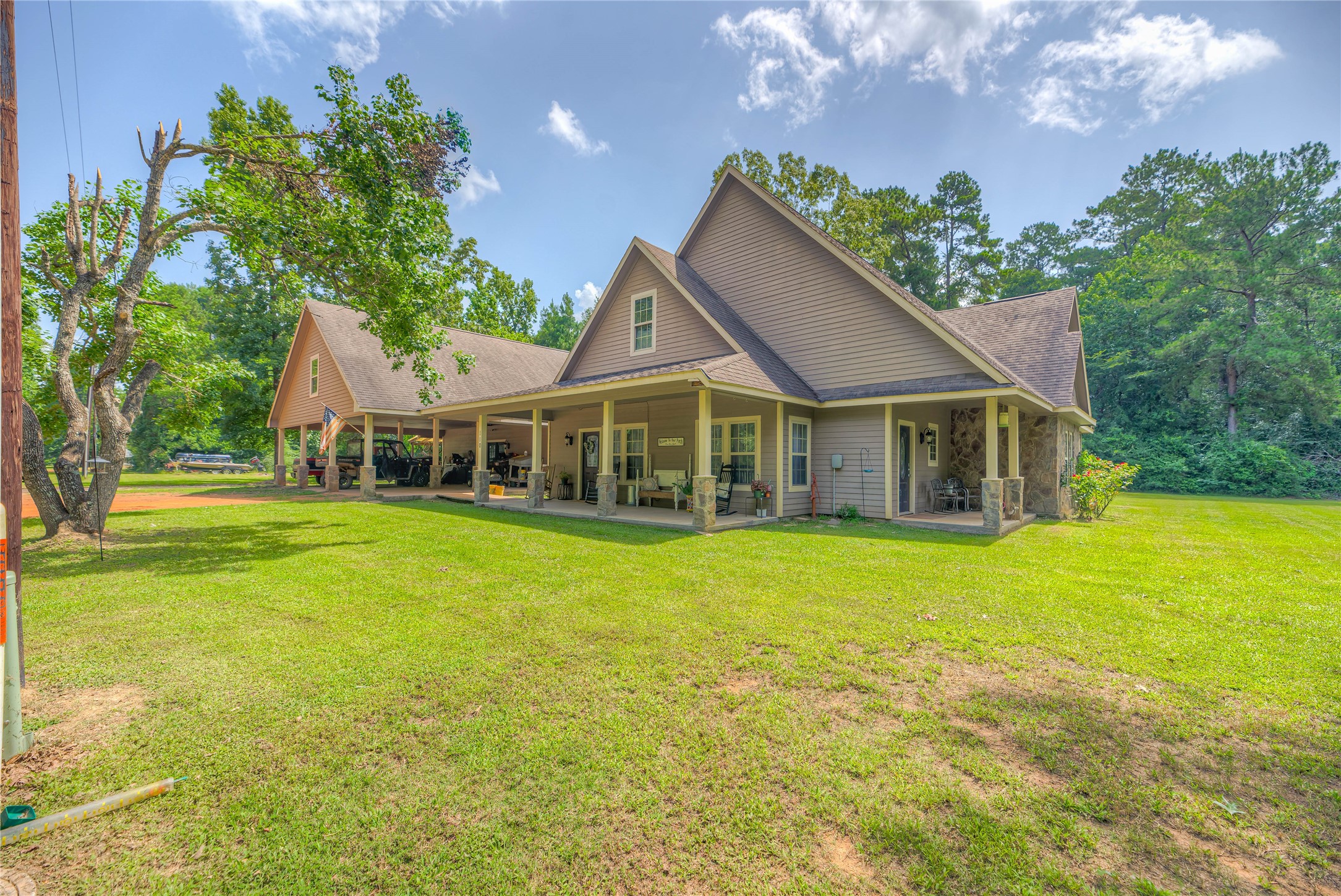110 Happy Trails Road Coldspring, TX 77331 - Photo 31 of 49 a front view of house with yard and green space