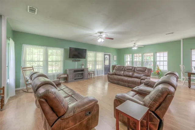 a kitchen with sink stove and cabinets