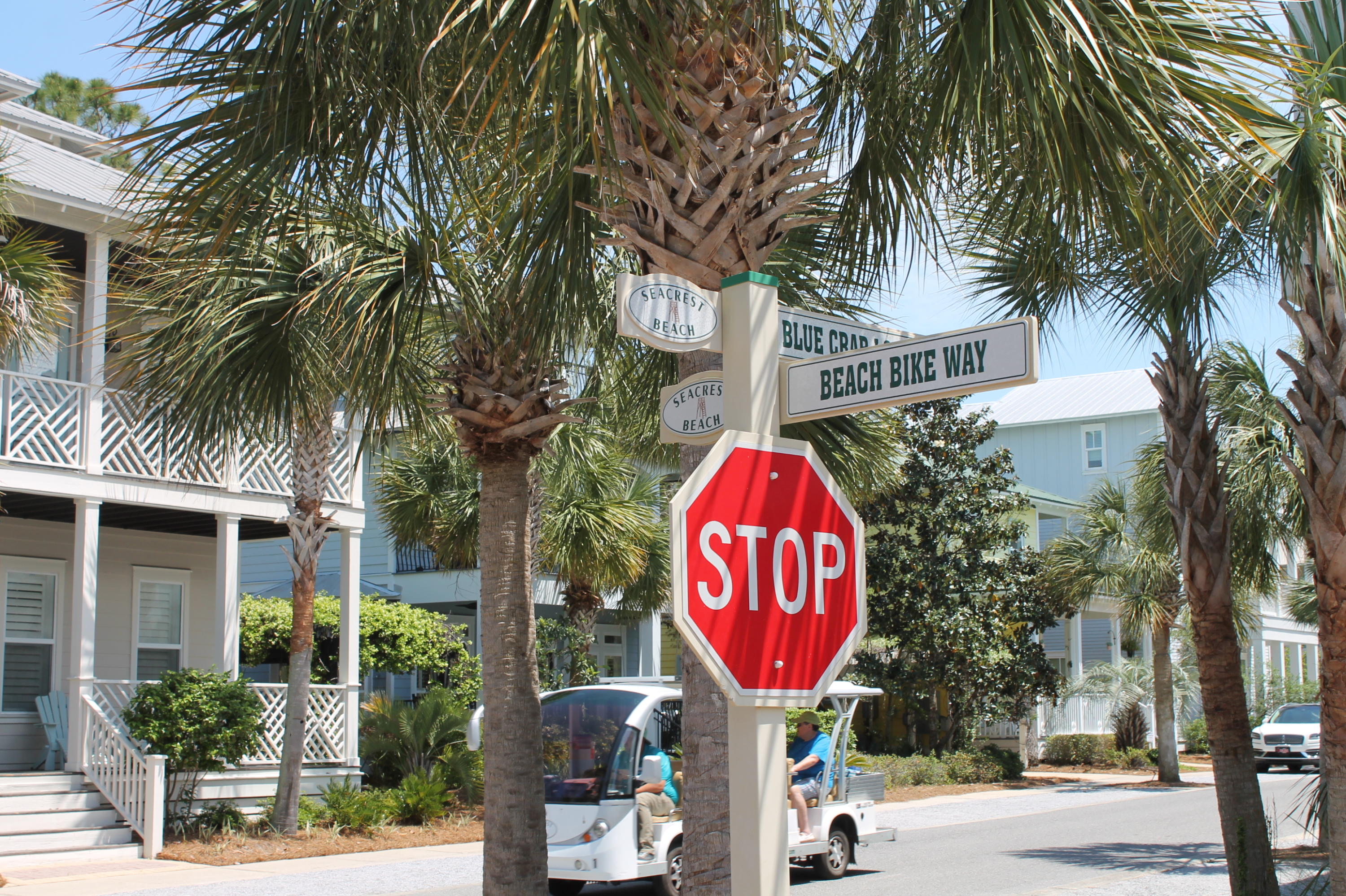 Lot 7 Lazy Day Ln Inlet Beach, Unit LOT 7 Inlet Beach, FL 32461 - Photo 12 of 12 a front view of multi story residential apartment building with sign board and yard