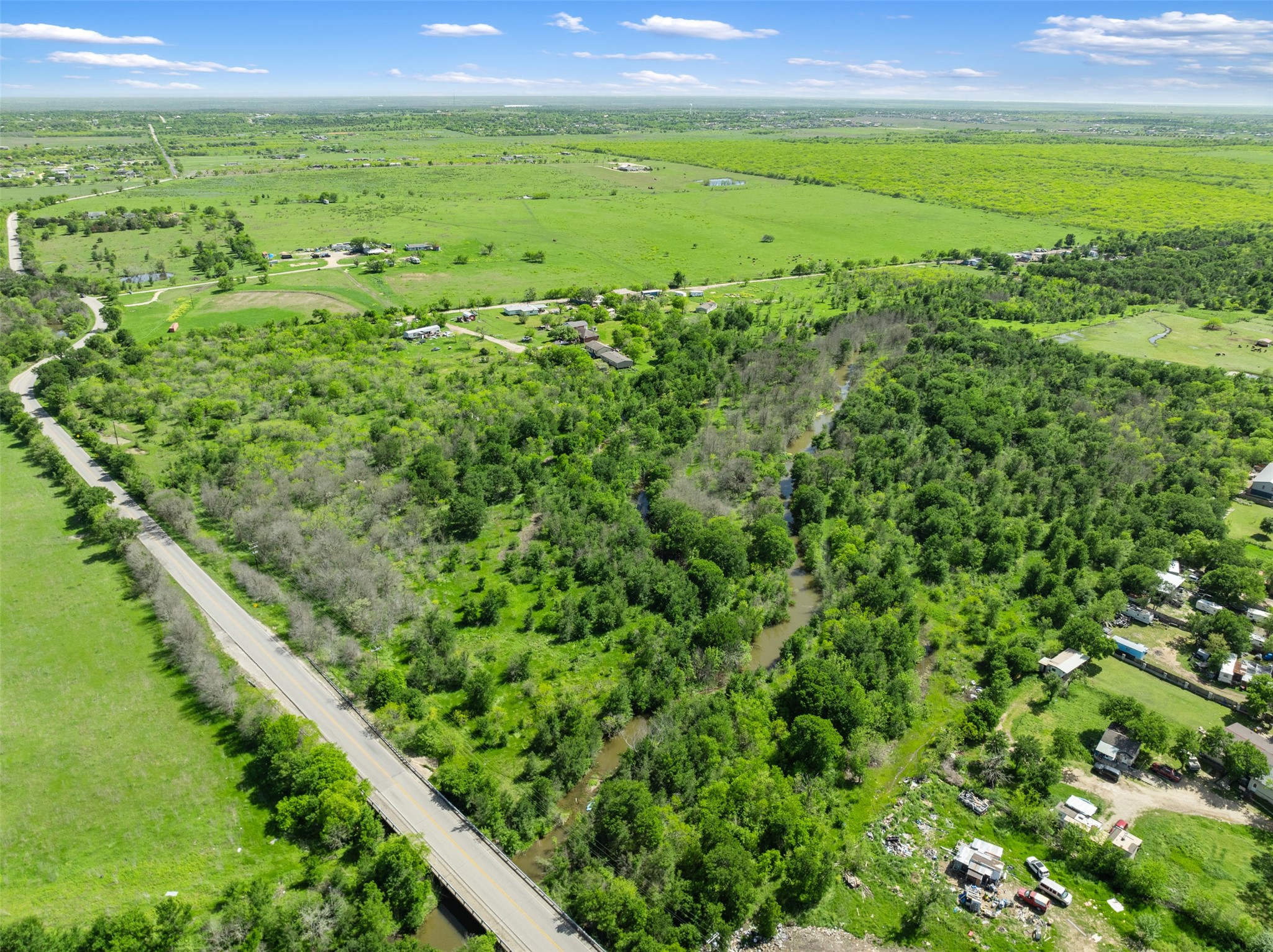 0 Jacobson Road Del Valle, TX 78617 - Photo 18 of 40 a view of an outdoor space with a lake view