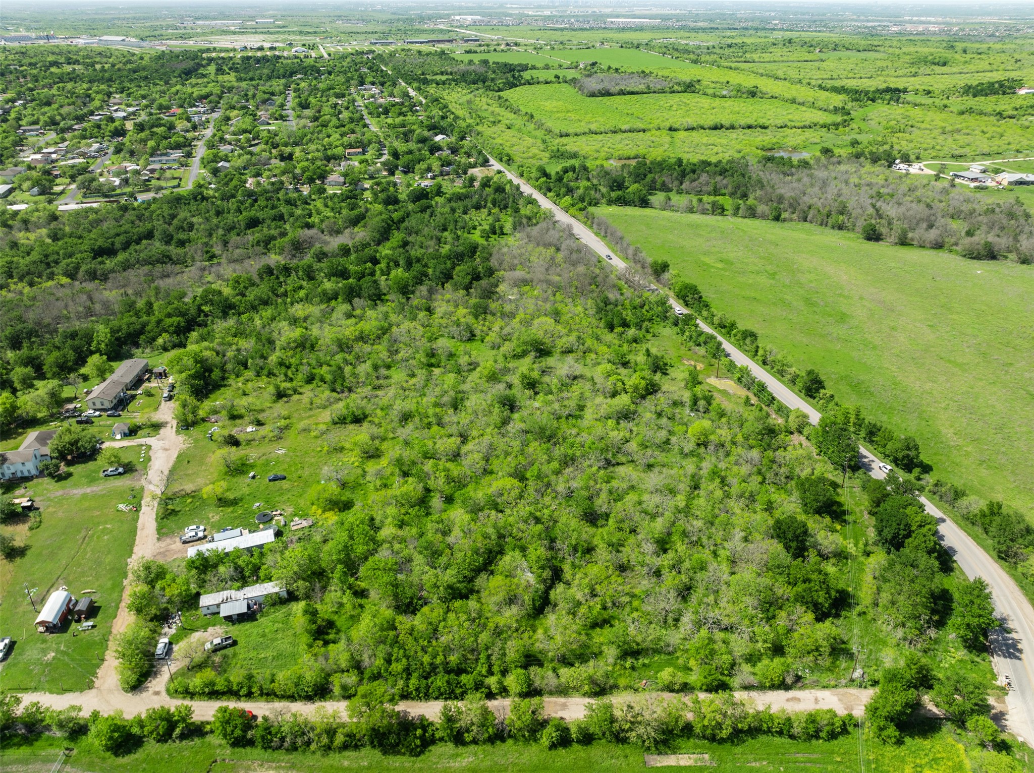 0 Jacobson Road Del Valle, TX 78617 - Photo 27 of 40 a view of a green field with lots of green space