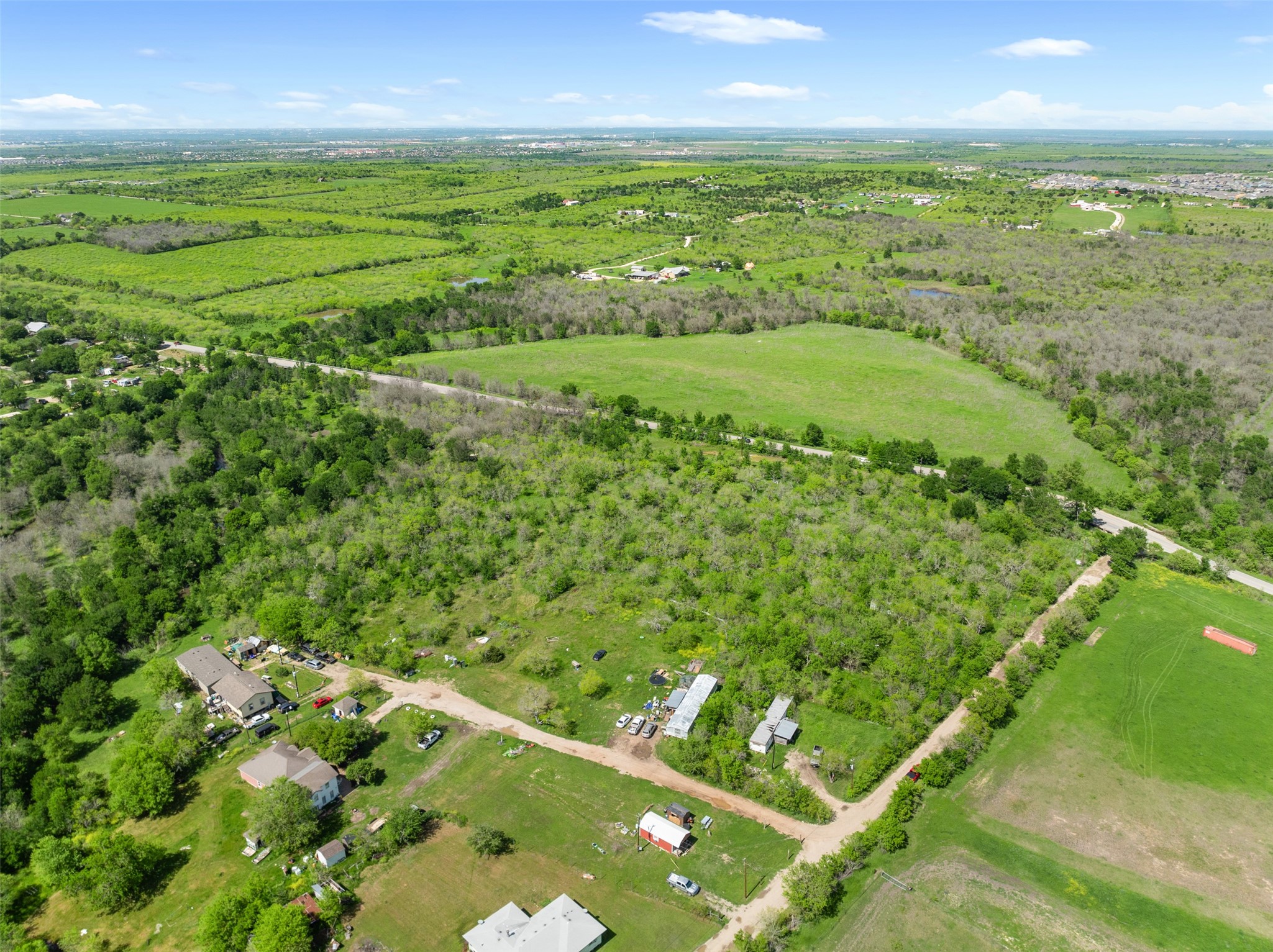 0 Jacobson Road Del Valle, TX 78617 - Photo 3 of 40 a view of an outdoor space and a lake view