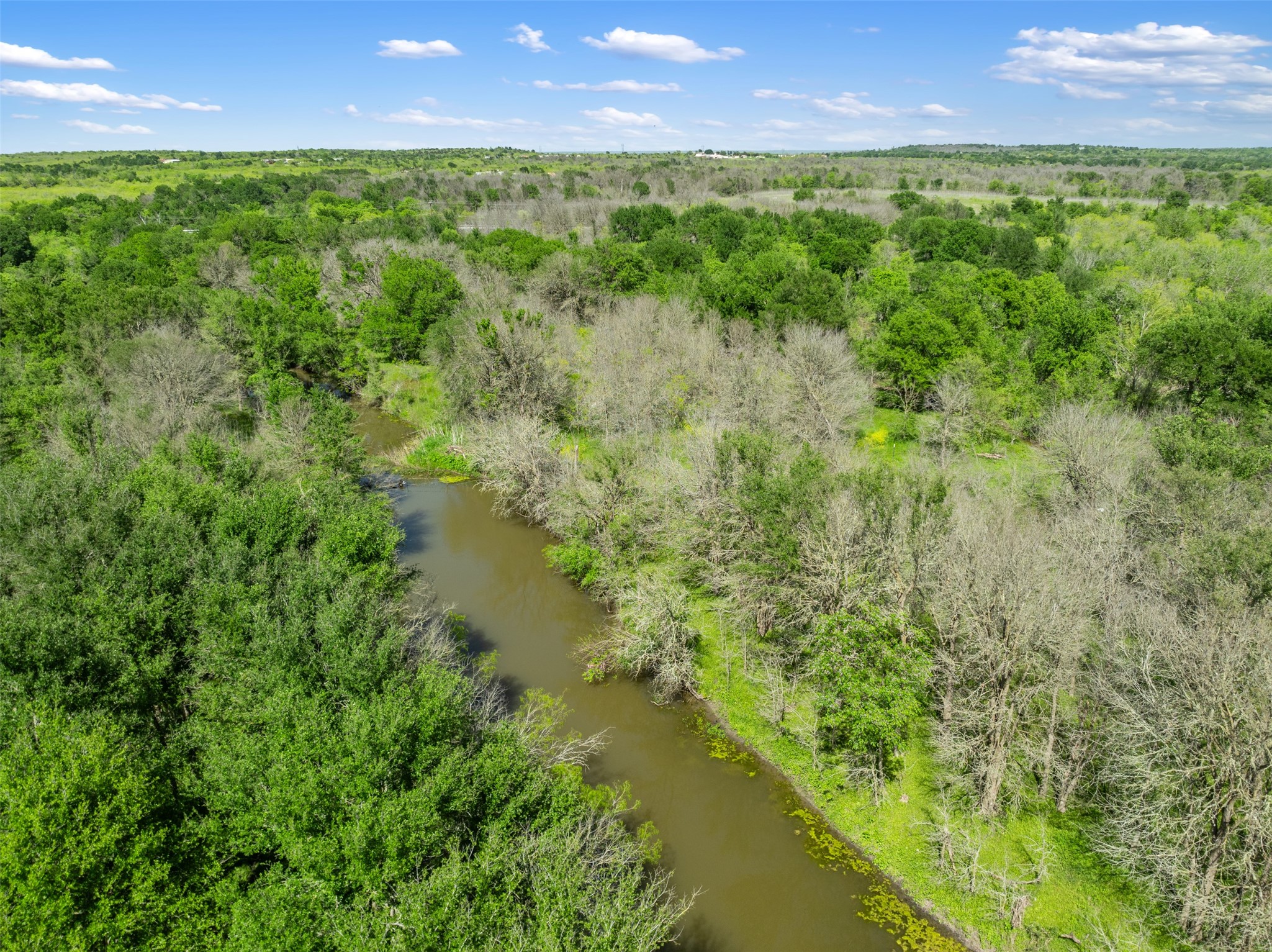 0 Jacobson Road Del Valle, TX 78617 - Photo 32 of 40 a view of lake with a yard