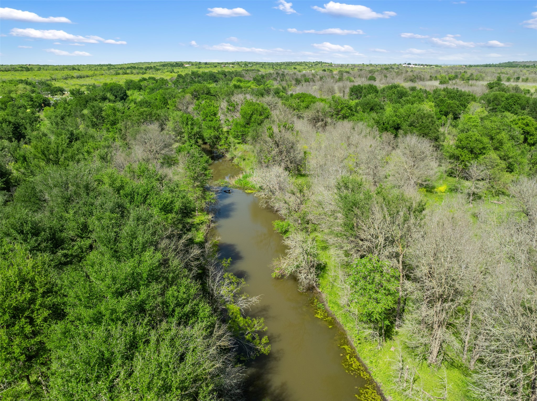 0 Jacobson Road Del Valle, TX 78617 - Photo 33 of 40 a view of lake with a yard
