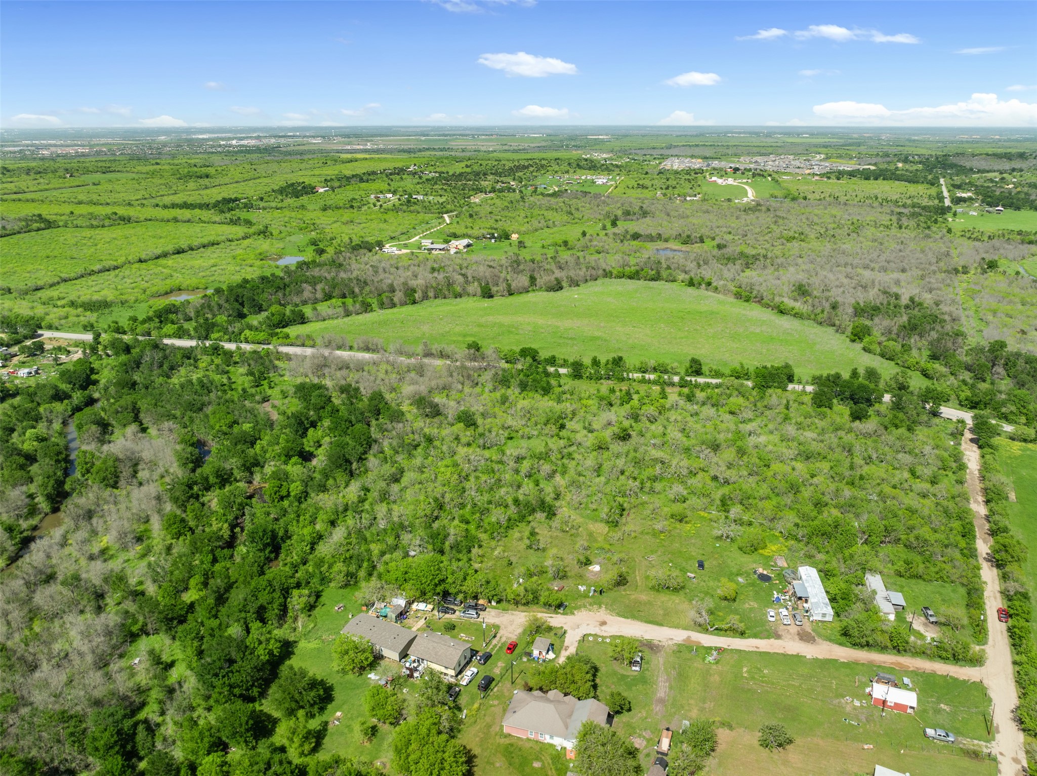 0 Jacobson Road Del Valle, TX 78617 - Photo 6 of 40 a view of an outdoor space and a lake view