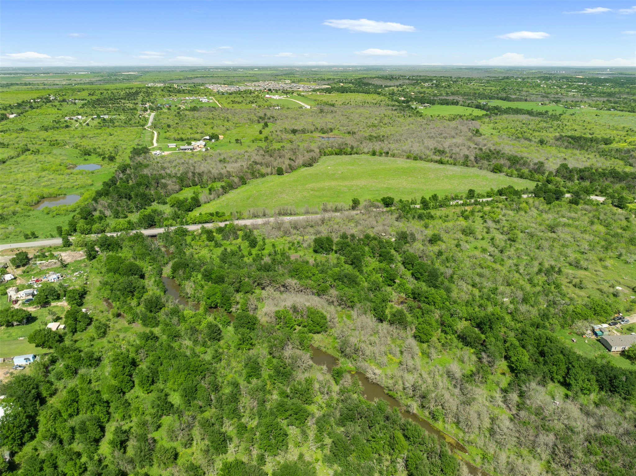 0 Jacobson Road Del Valle, TX 78617 - Photo 10 of 40 a view of an outdoor space and a yard