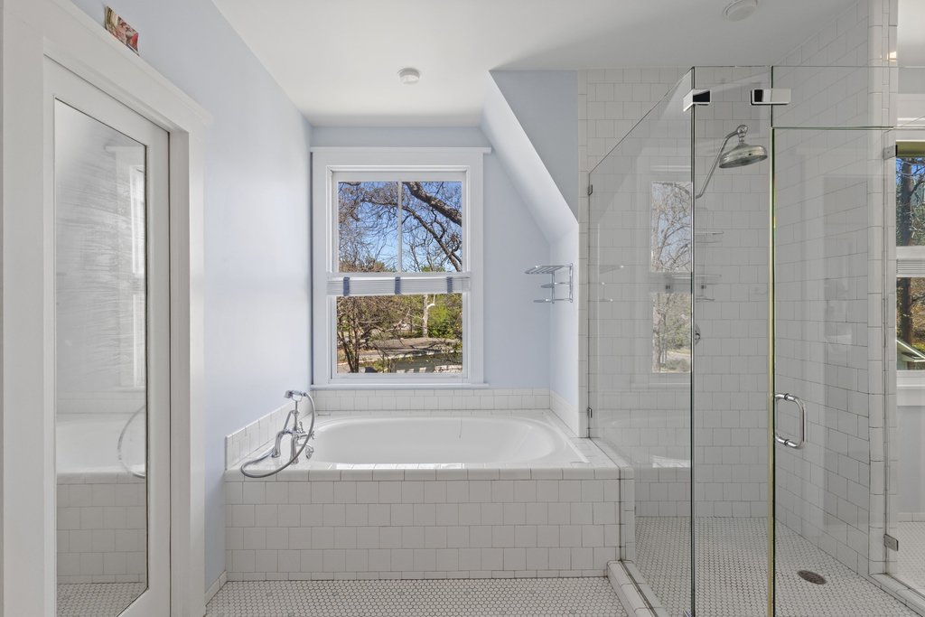 3107 Beverly Road Austin, TX 78703 - Photo 23 of 40 a bathroom with a bathtub and shower