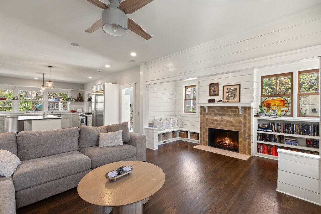 3107 Beverly Road Austin, TX 78703 - Photo 8 of 40 a living room with furniture and a fireplace