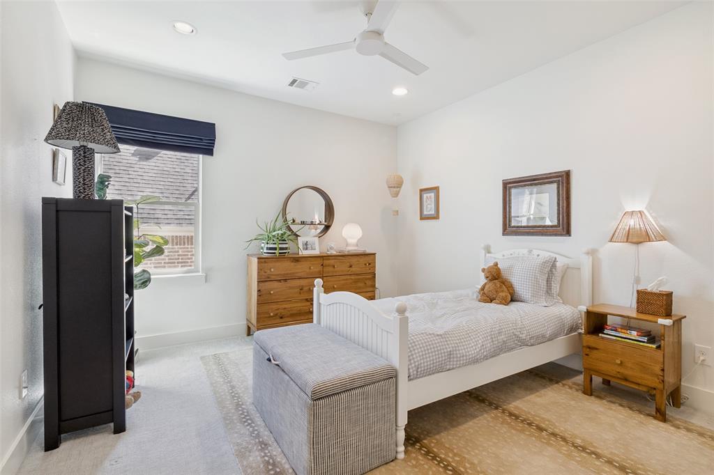 7533 Garonne Street Dallas, TX 75231 - Photo 20 of 32 a bedroom with bed and window