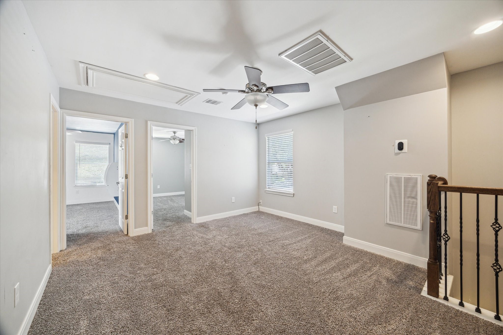 6047 Floyd Street Houston, TX 77007 - Photo 11 of 22 an empty room with closet and a ceiling fan