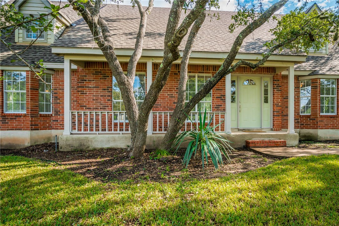 504 Explorer Lakeway, TX 78734 - Photo 1 of 1 a view of a house with a yard
