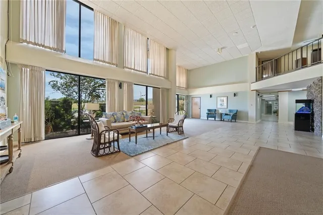 a view of a balcony with furniture