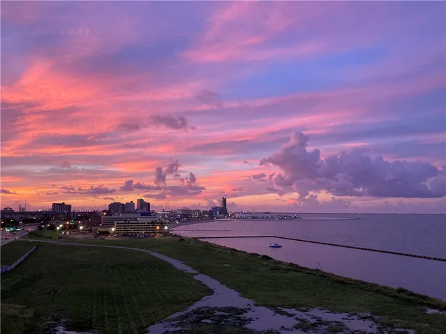 a view of a city with sunset