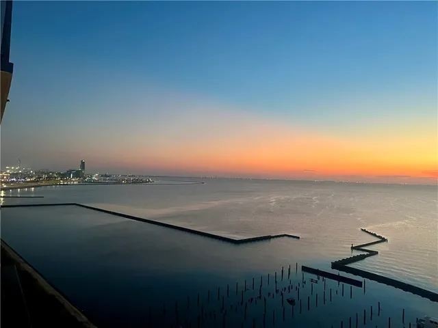 a view of an ocean from a balcony