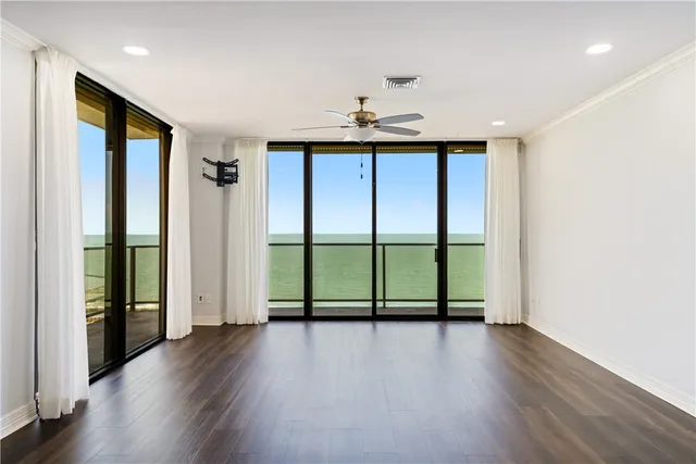 a bathroom with a sink a vanity and a large mirror