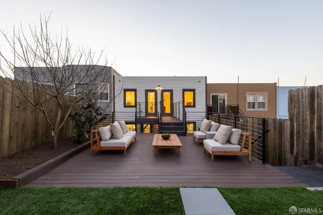 a outdoor space with patio the couches and a potted plant