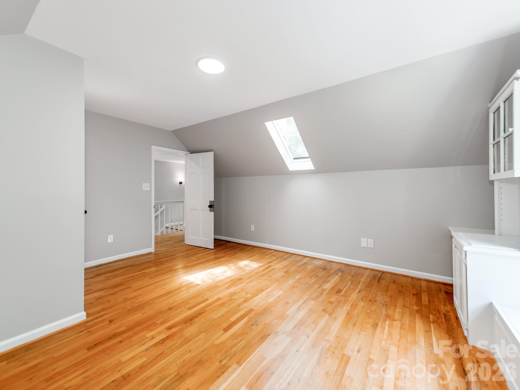 113 Falls Street Morganton, NC 28655 - Photo 20 of 33 a view of empty room with wooden floor