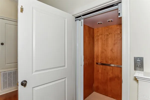 a view of empty room with windows