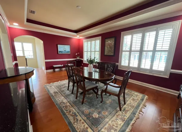 a view of a room with toys and a ceiling fan