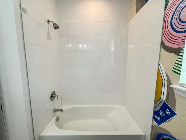 an empty room with wooden floor