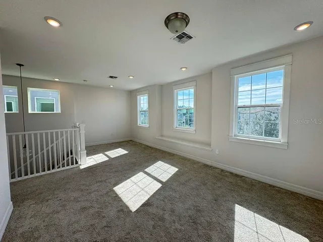 a view of a terrace with a lake view
