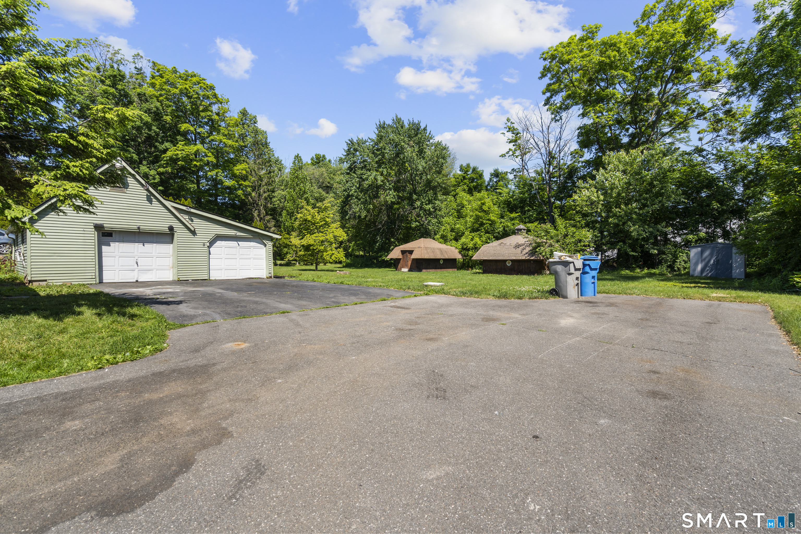 175 Moody Street Bristol, CT 06010 - Photo 23 of 28 a view of street and small trees