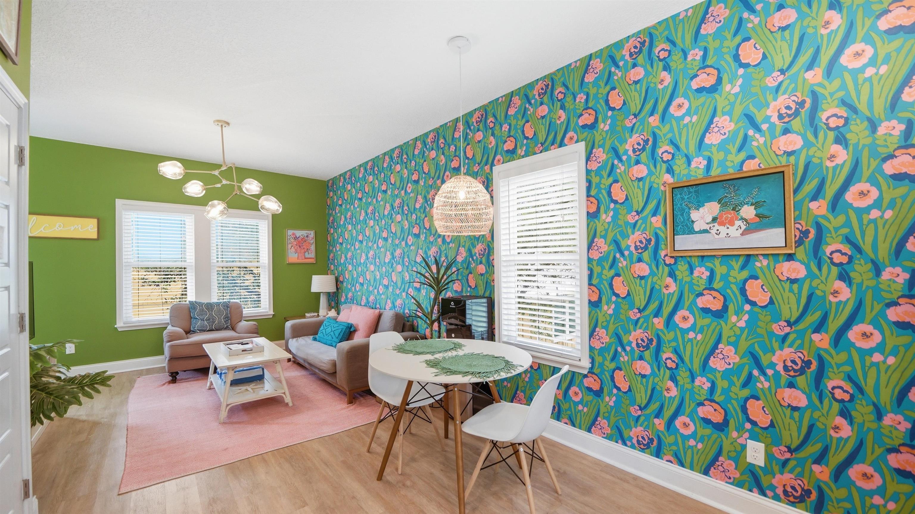 251 Riberia Street St. Augustine, FL 32084 - Photo 42 of 94 a living room filled with furniture and a table
