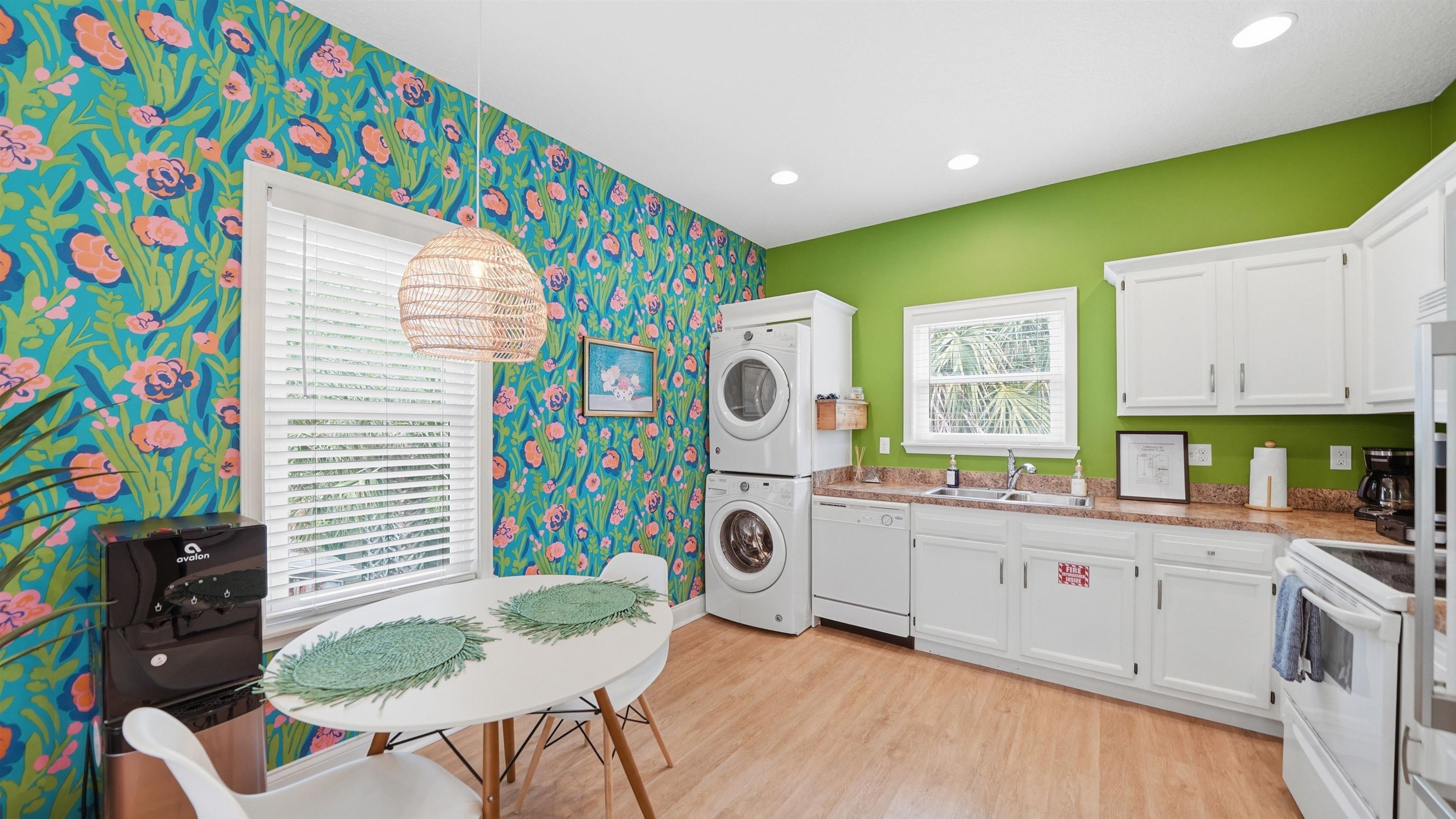 251 Riberia Street St. Augustine, FL 32084 - Photo 43 of 94 a kitchen that has a lot of furniture and appliances in it