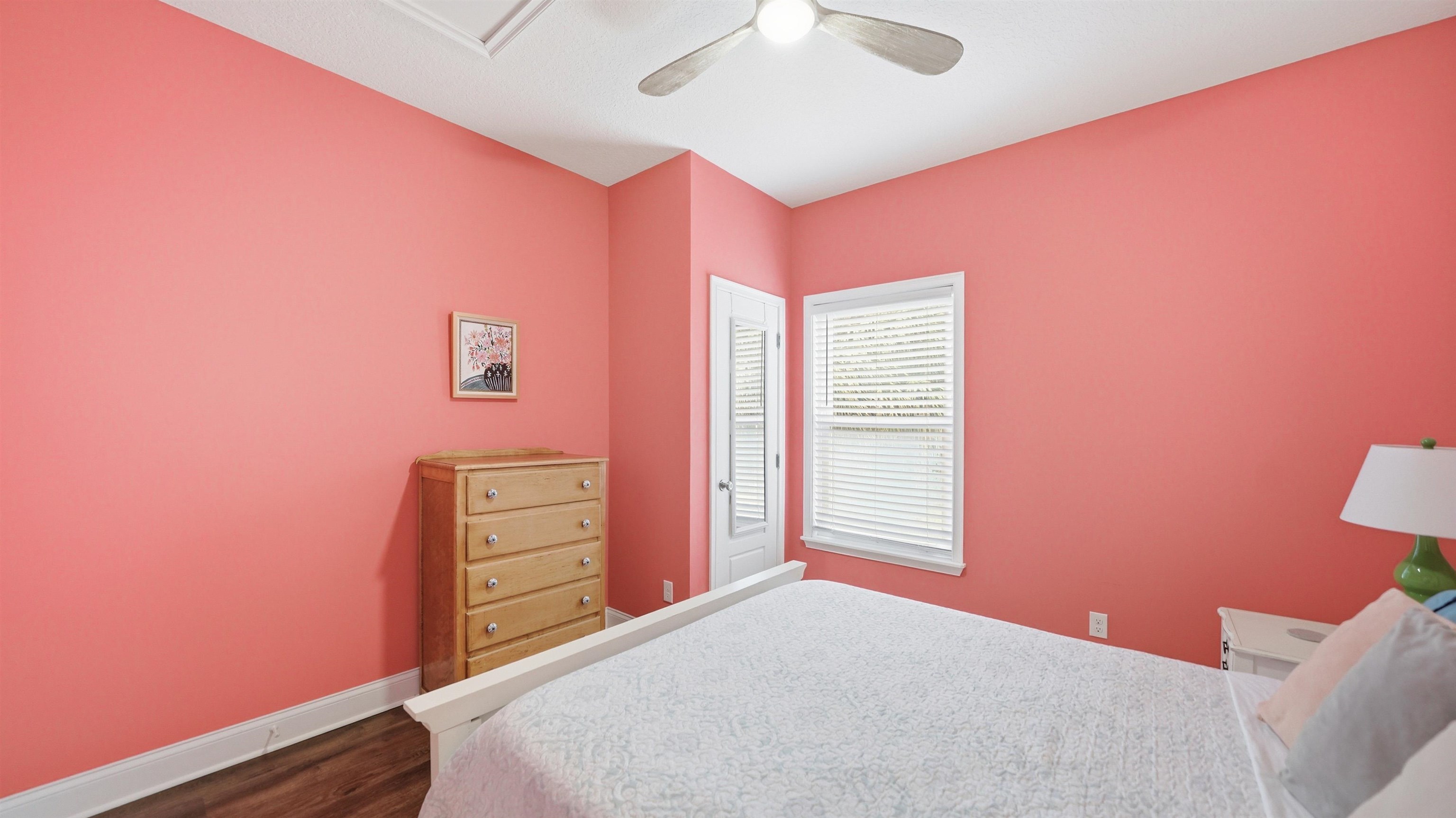 251 Riberia Street St. Augustine, FL 32084 - Photo 49 of 94 a bedroom with a bed and a dresser