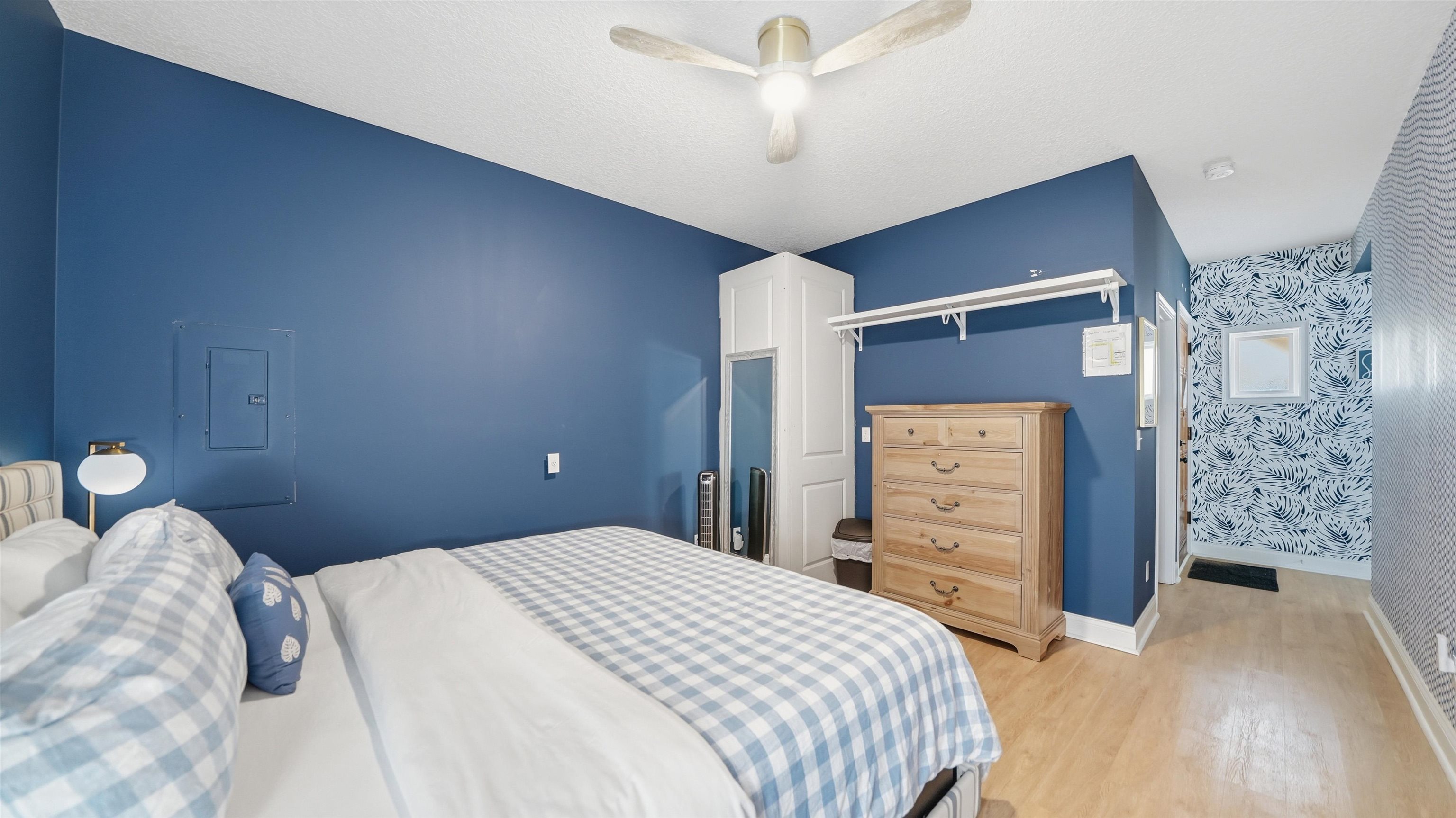 251 Riberia Street St. Augustine, FL 32084 - Photo 66 of 94 a bedroom with a bed and a dresser