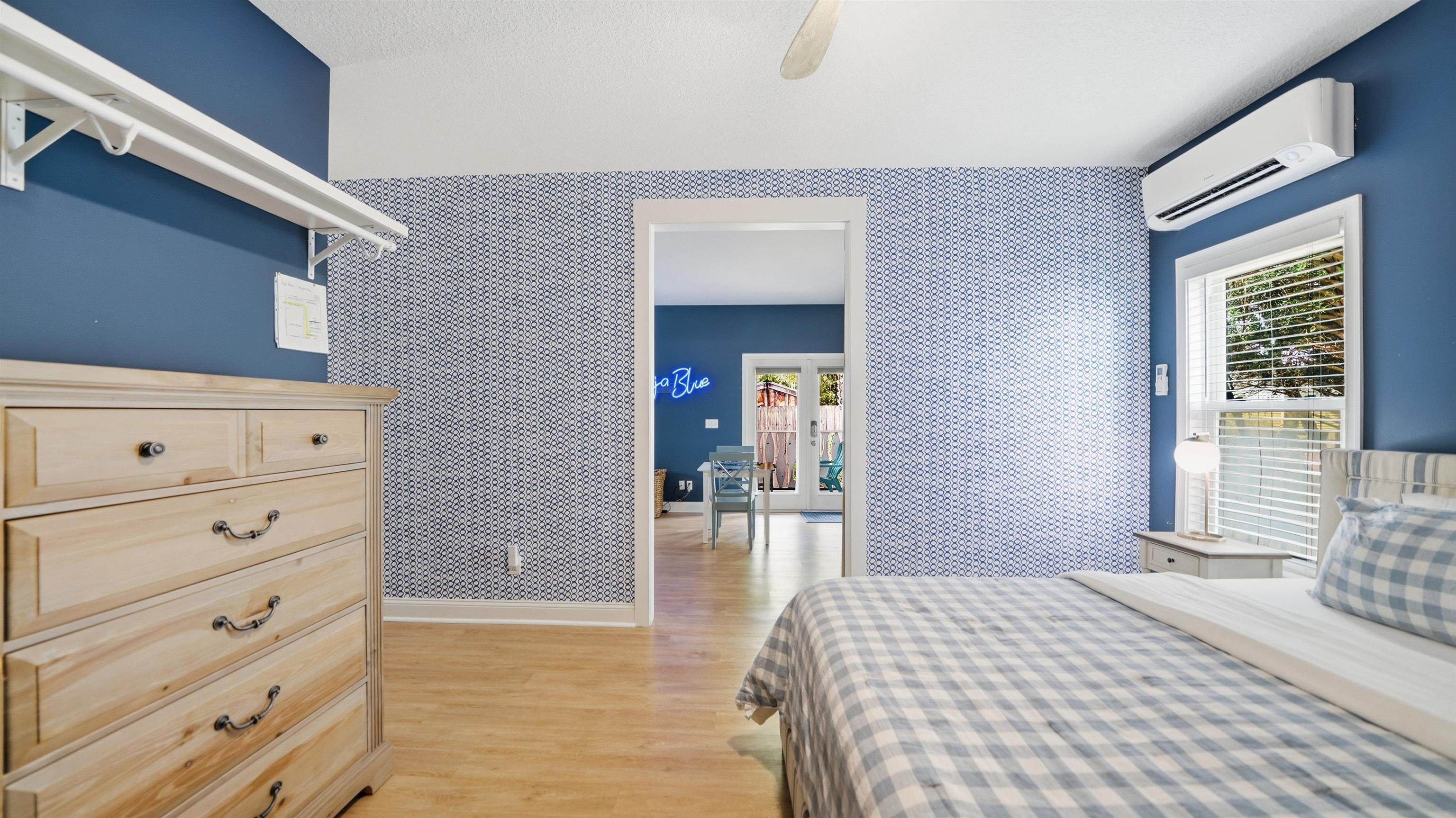 251 Riberia Street St. Augustine, FL 32084 - Photo 67 of 94 a bedroom with a bed and a dresser
