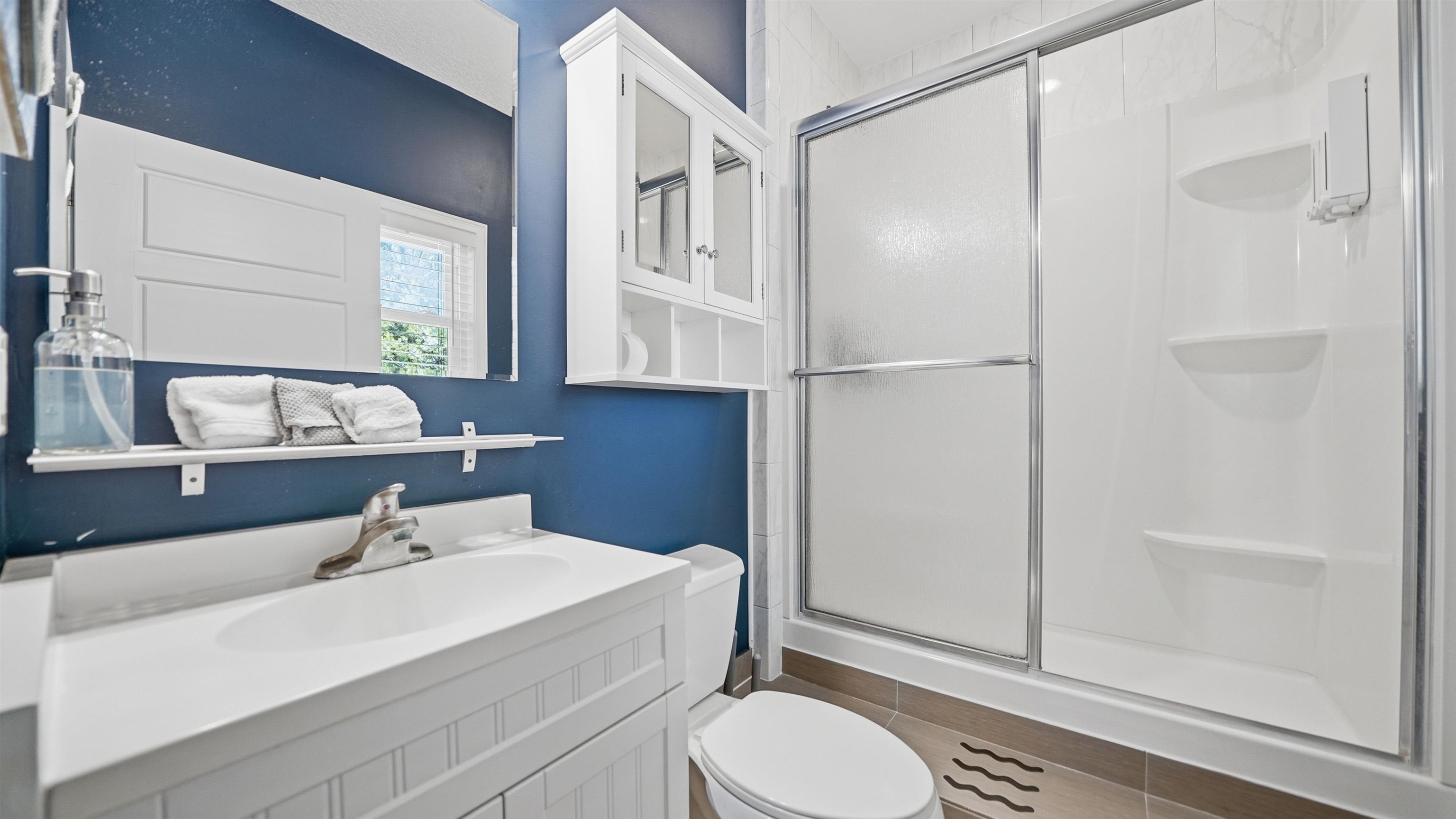 251 Riberia Street St. Augustine, FL 32084 - Photo 68 of 94 a bathroom with a sink toilet and shower