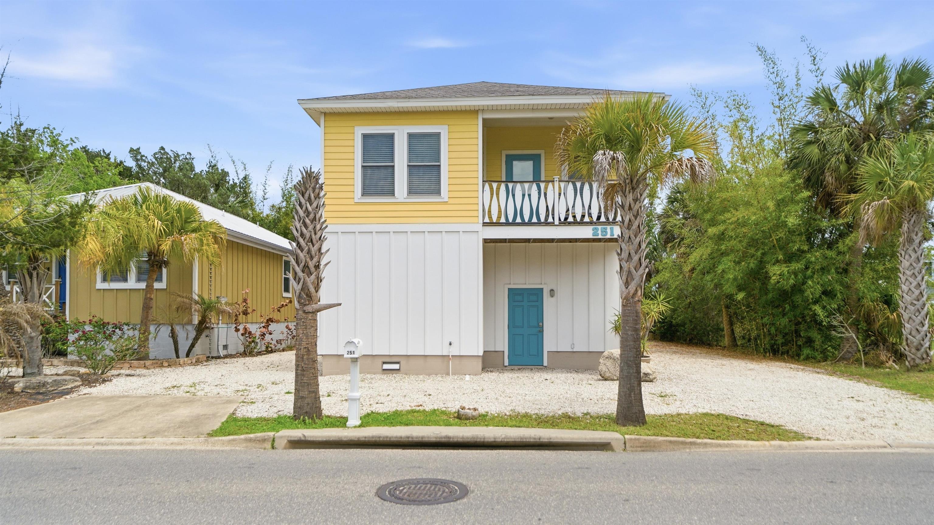 251 Riberia Street St. Augustine, FL 32084 - Photo 78 of 94 a front view of a house with a yard and garage