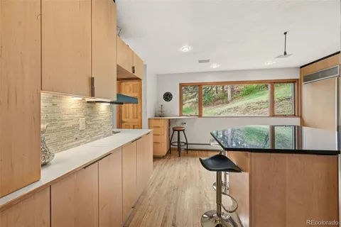 a living room with large windows