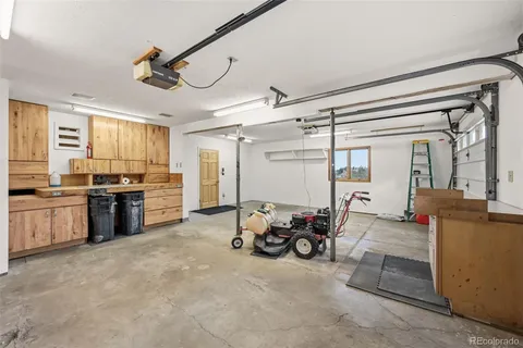 a view of a kitchen with furniture and a window