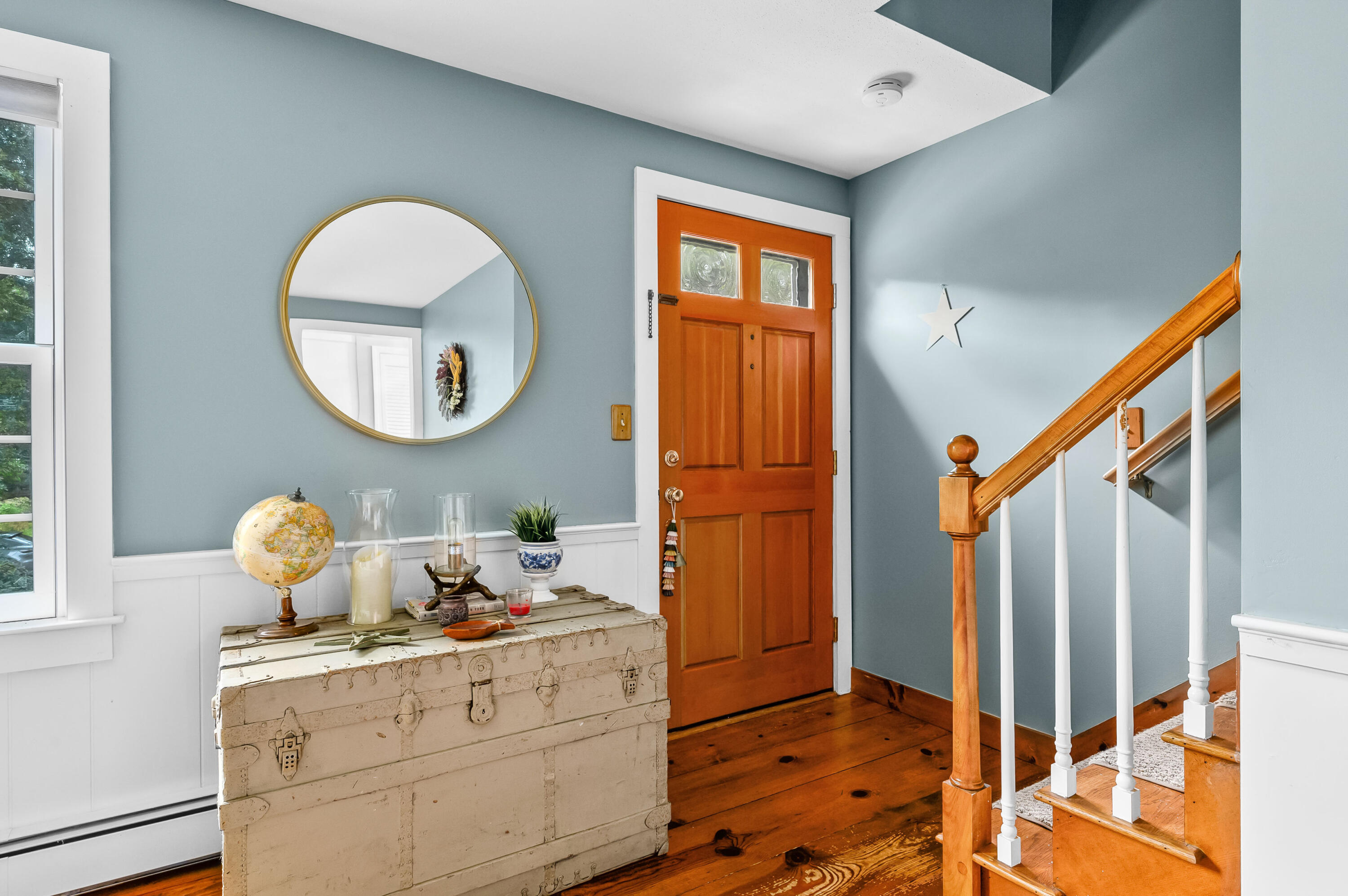 42 Marble Road Barnstable, MA 02630 - Photo 11 of 37 a room with round mirror and cabinets