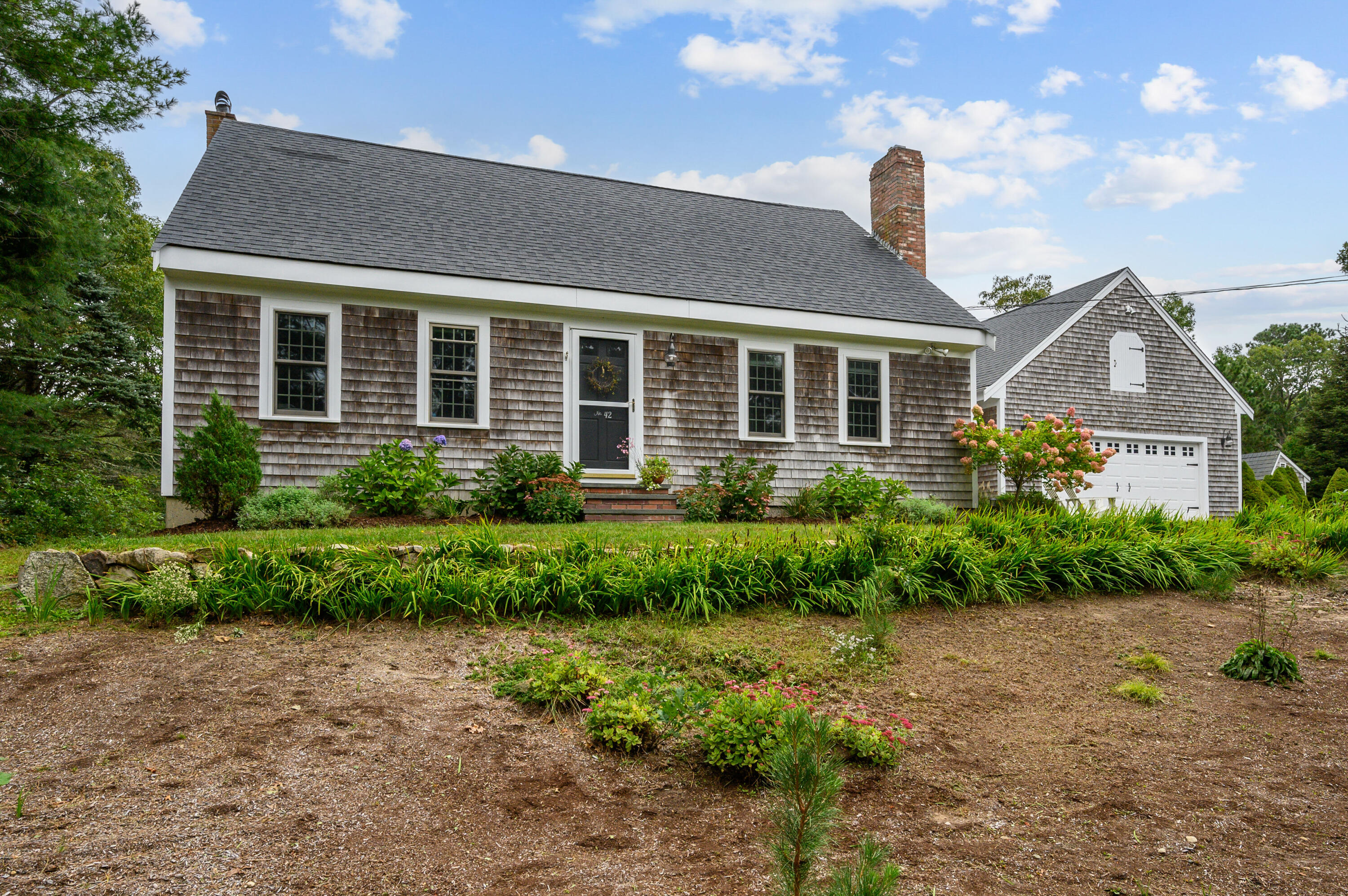 42 Marble Road Barnstable, MA 02630 - Photo 2 of 37 a front view of a house with garden