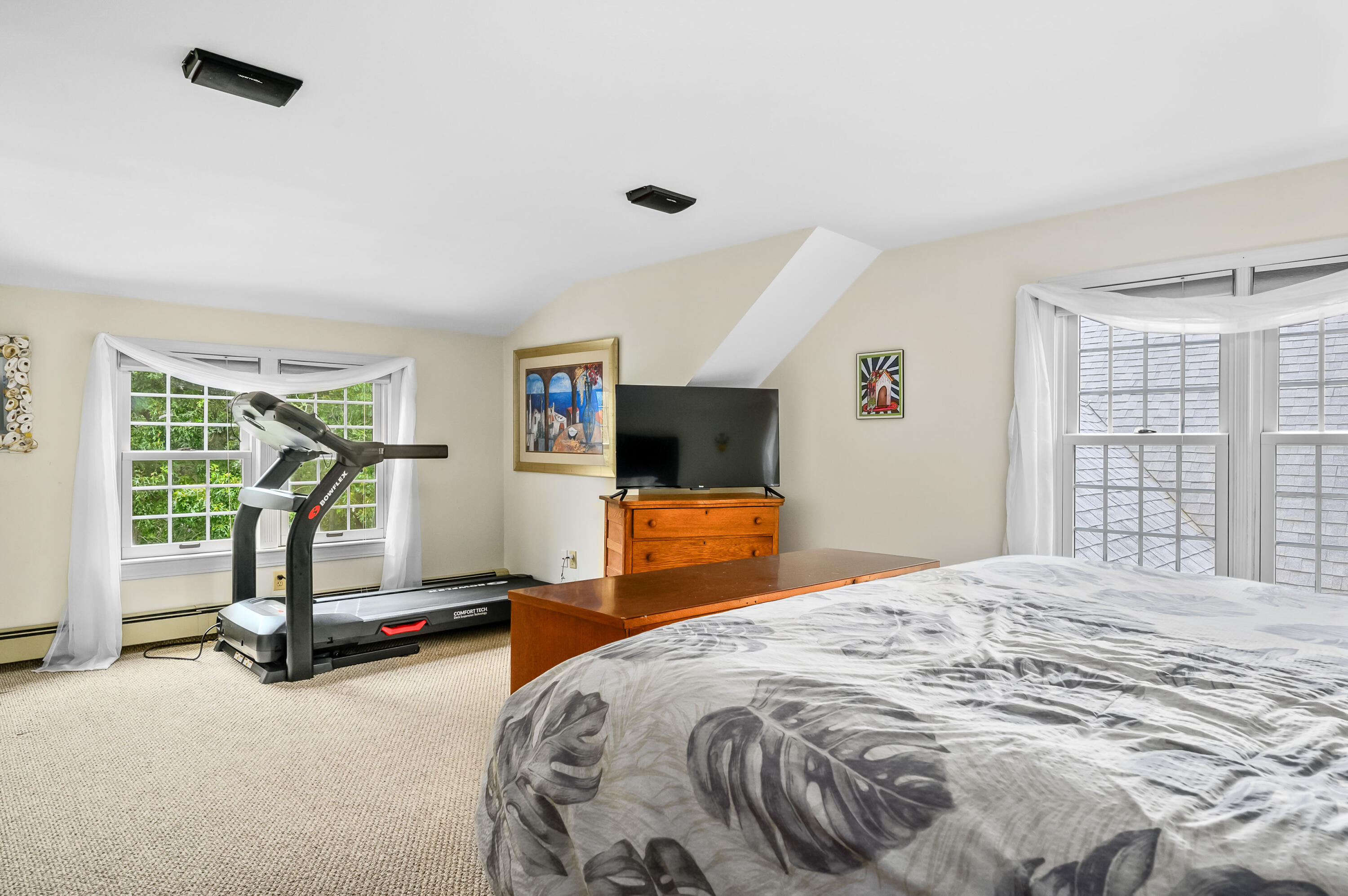 42 Marble Road Barnstable, MA 02630 - Photo 27 of 37 a bedroom with a bed and large windows