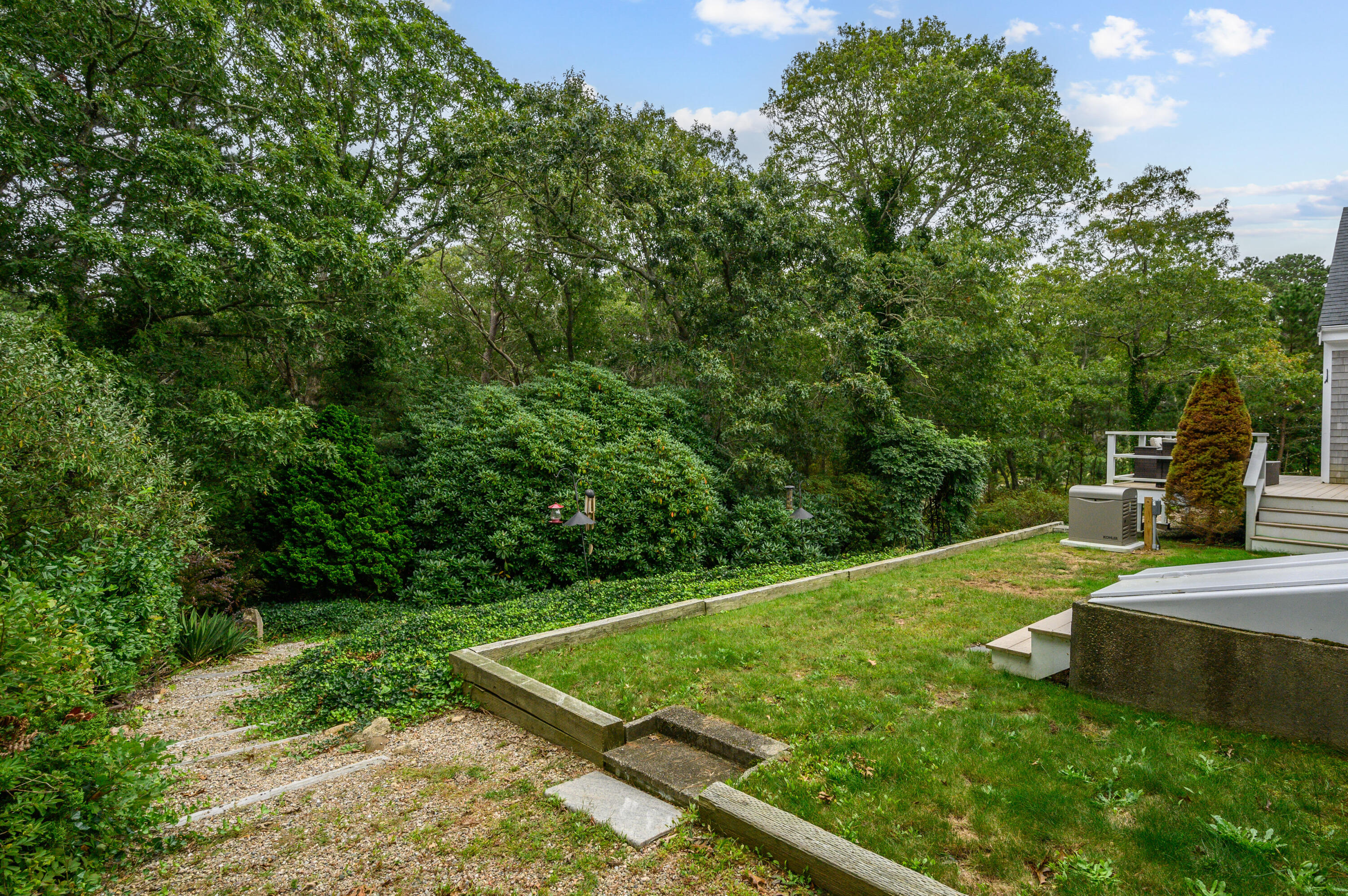 42 Marble Road Barnstable, MA 02630 - Photo 6 of 37 a view of a backyard with sitting area