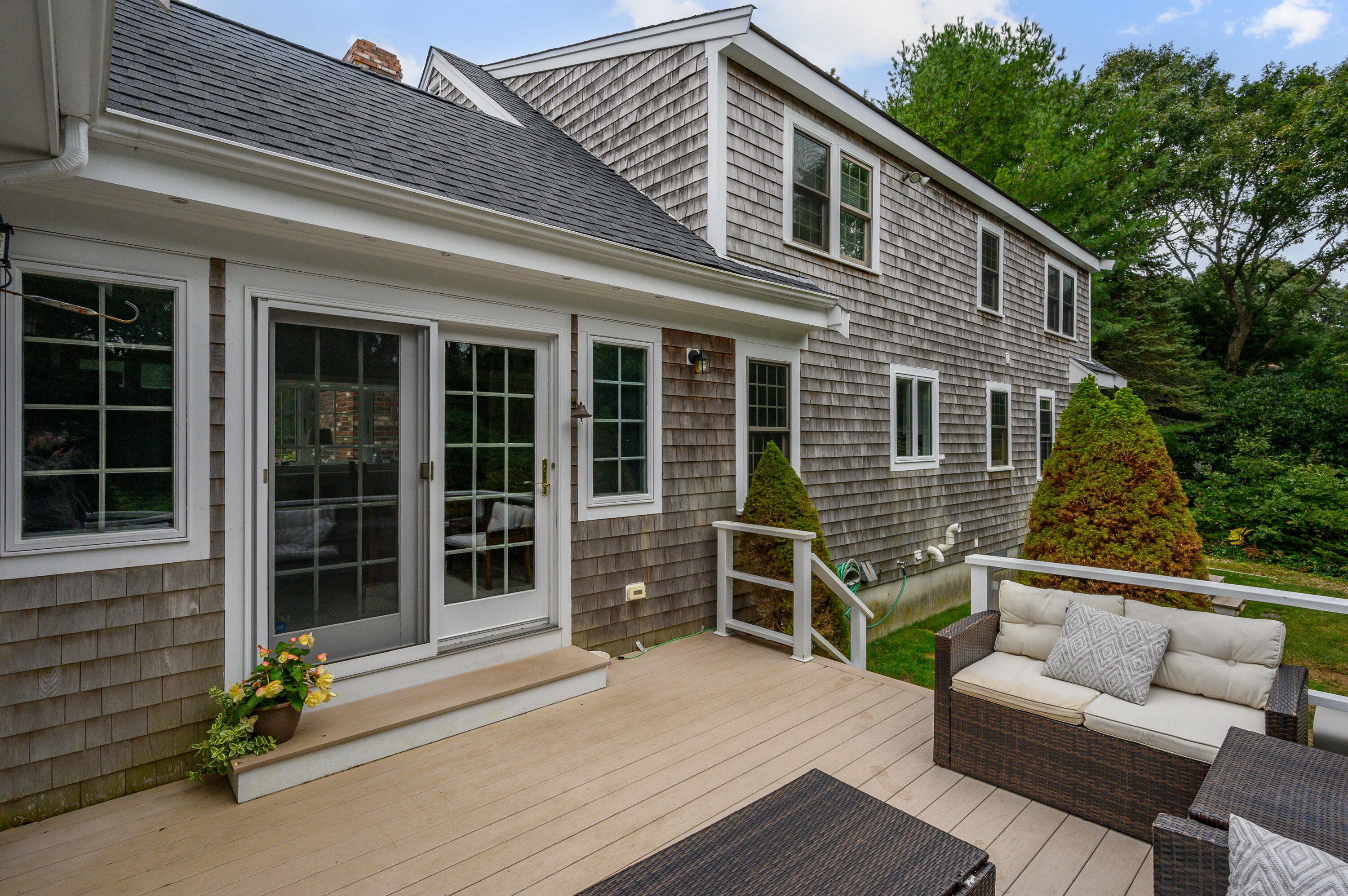 42 Marble Road Barnstable, MA 02630 - Photo 7 of 37 a balcony with furniture and a potted plant