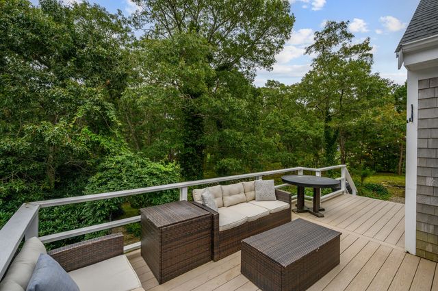 a view of a two chairs in the deck