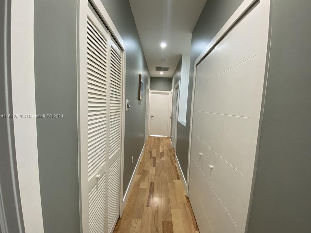 3445 Southwest 14th Street, Unit 3445 Miami, FL 33145 - Photo 27 of 52 a view of gallery with wooden floor