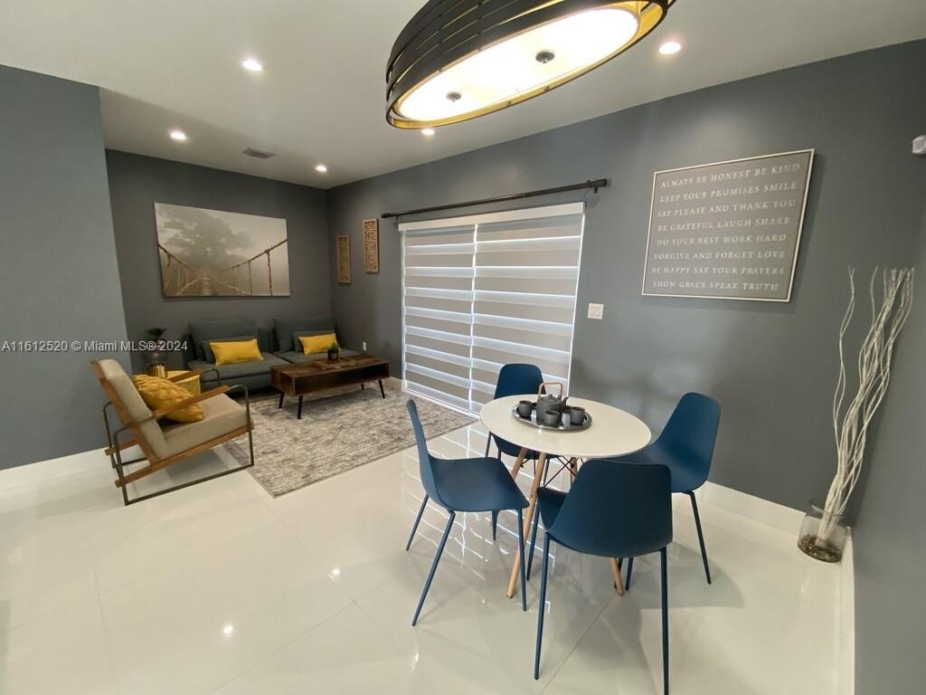 3445 Southwest 14th Street, Unit 3445 Miami, FL 33145 - Photo 37 of 52 a work room with furniture and rug