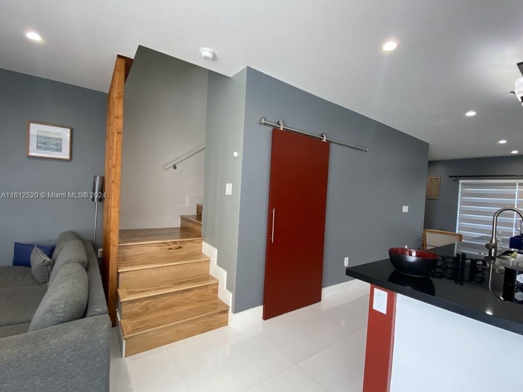 3445 Southwest 14th Street, Unit 3445 Miami, FL 33145 - Photo 46 of 52 a living room with furniture and a large window