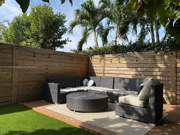 a view of a garden with a bench