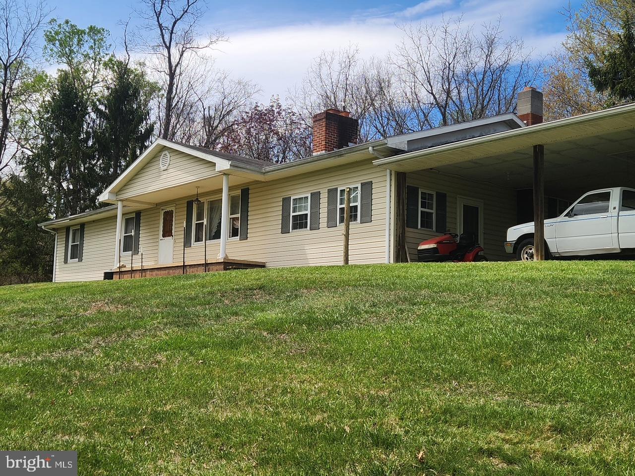 4309 Old Fields Road Old Fields, WV 26845 - Photo 3 of 40 a view of a house with a backyard