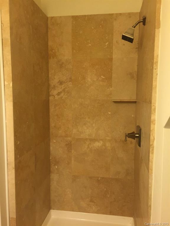 521 Grandin Road Charlotte, NC 28208 - Photo 11 of 23 a bathroom with a shower